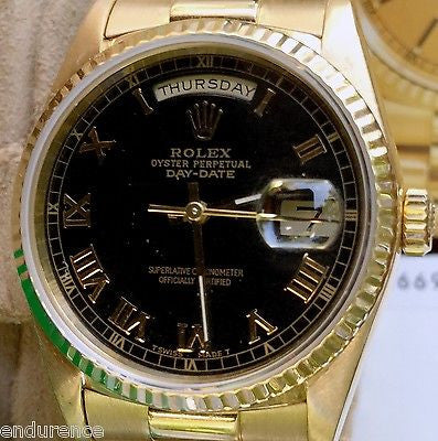 rolex president gold black dial