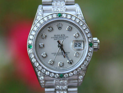 white band watch with diamonds