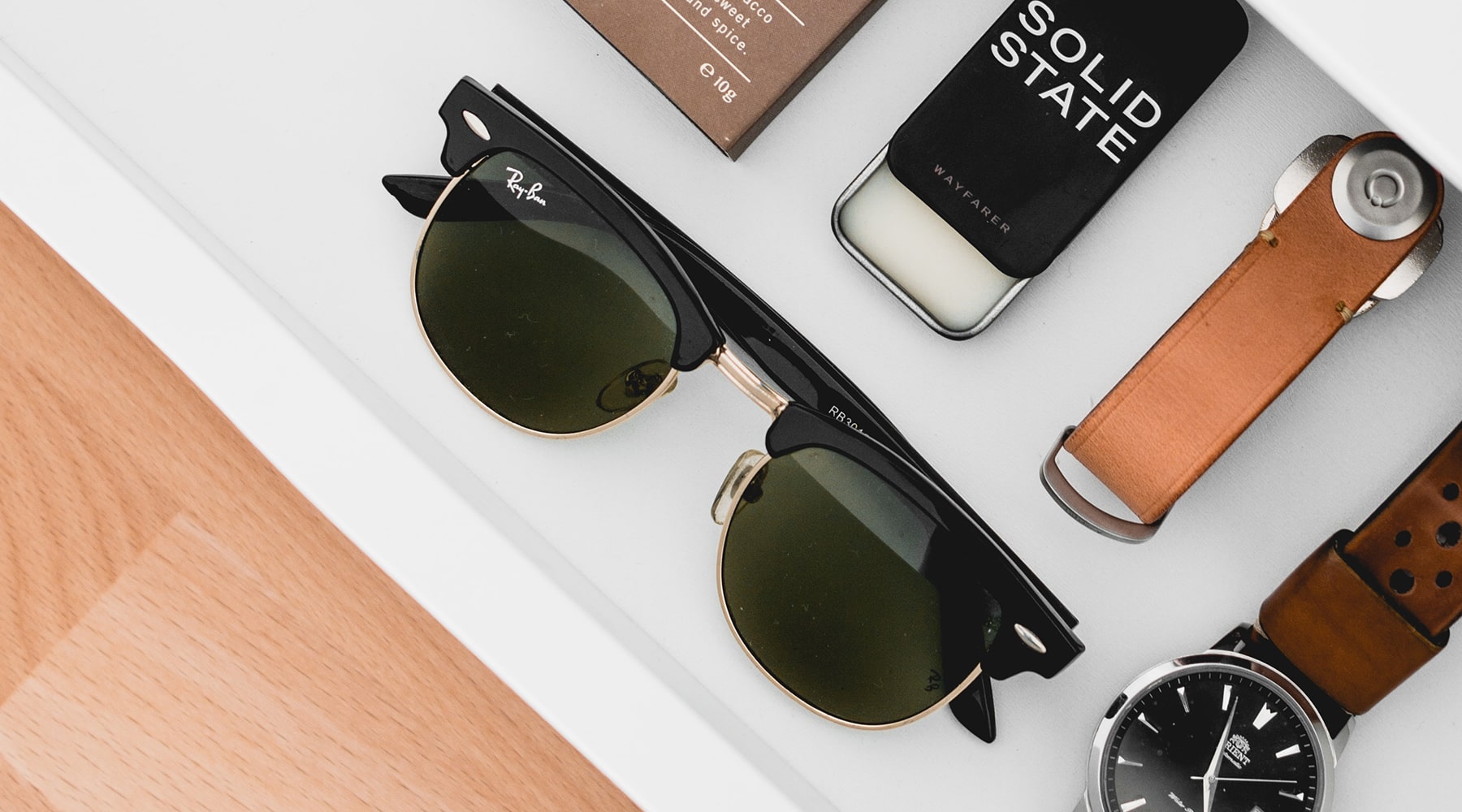 sunglass-flatlay-with-accessories