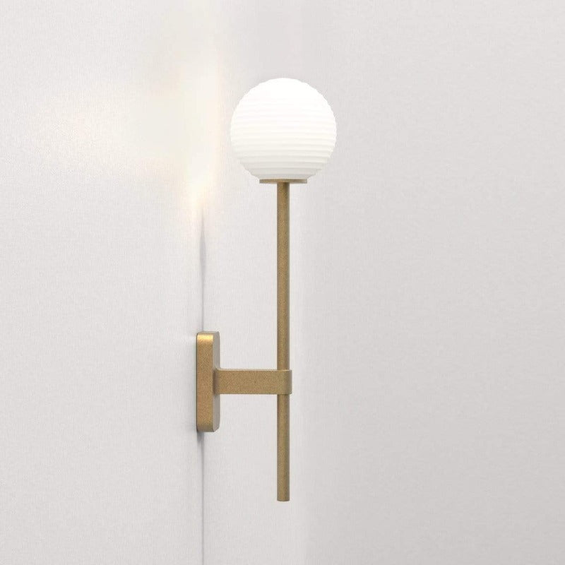 brass globe wall light