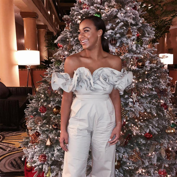 Nia Sioux wearing Glamrocks at holiday party