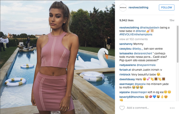 Hailey Baldwin with the FUNBOY White Swan Pool Float