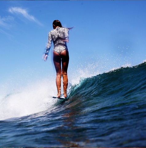 Surfer riding an ocean wave
