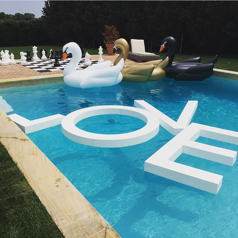 The FUNBOY White, Gold and Black Swan at the Revolve Hamptons House