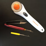 visible mending seam ripper and other cutting tools