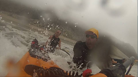 Day 3 - Greggy helping guide me out as I time my launch on final day through the shore break.