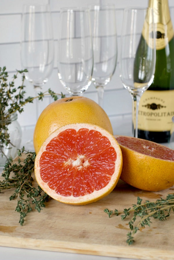 Sparkling hound grapefruit mimosa recipe to serve at your next brunch or lunchtime gathering. Four ingredient cocktail for parties. #mimosa #mimosabar #brunch #brunchrecipes #entertain #satsumadesigns