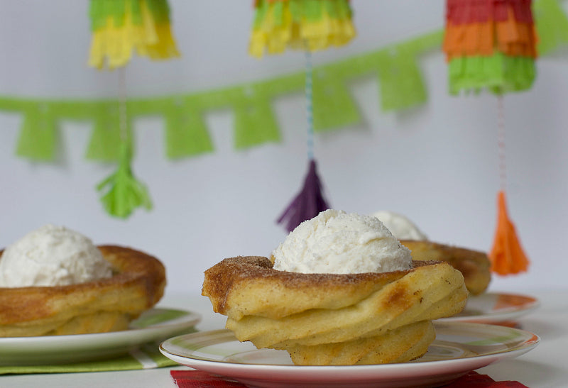 Click through to see my baked churro ice cream bowls that are a perfect treat for Cinco De Mayo parties or any old time. Takes you back to Disney too! | SatsumaDesigns.com #churro #disney #cincodemayo