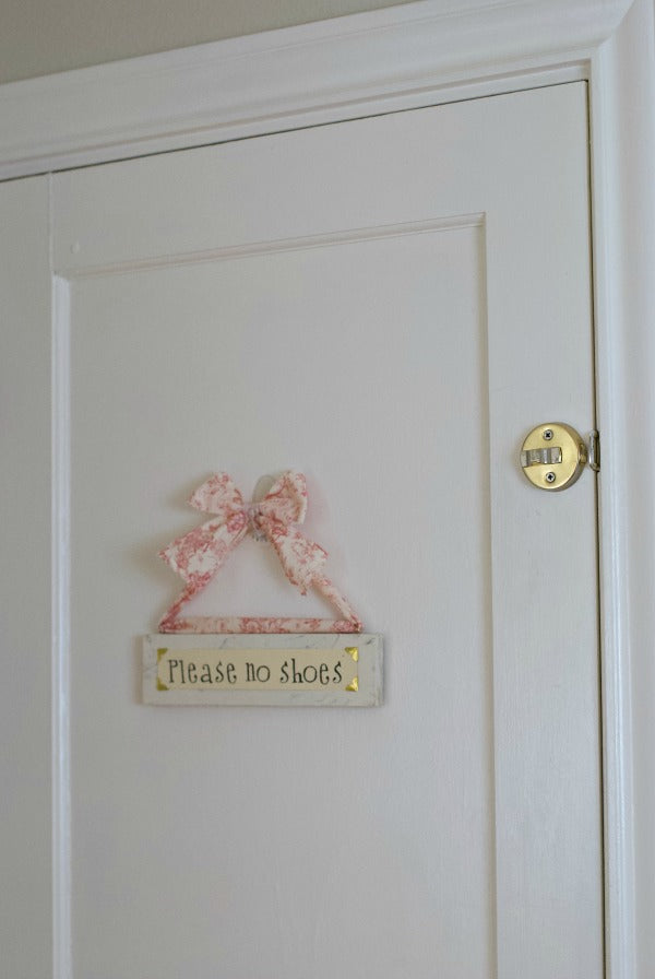 DIY Please no shoes sign to invite family and guests to remove their shoes at the front door or other spaces in the home. I made this fun and easy board to politely share my request in light of #covid19 and germs. #Covid19 #protect #limitgerms #diy #healthy #healthyhome