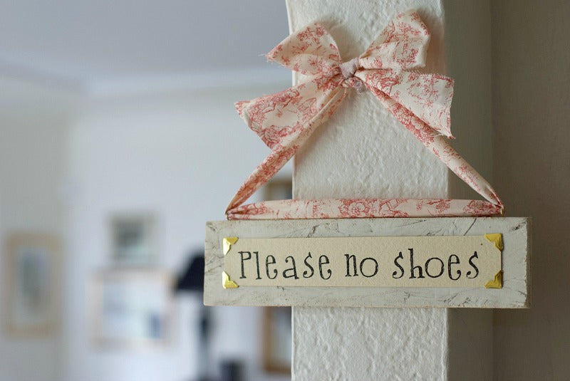 DIY Please no shoes sign to invite family and guests to remove their shoes at the front door or other spaces in the home. I made this fun and easy board to politely share my request in light of #covid19 and germs. #Covid19 #protect #limitgerms #diy #healthy #healthyhome