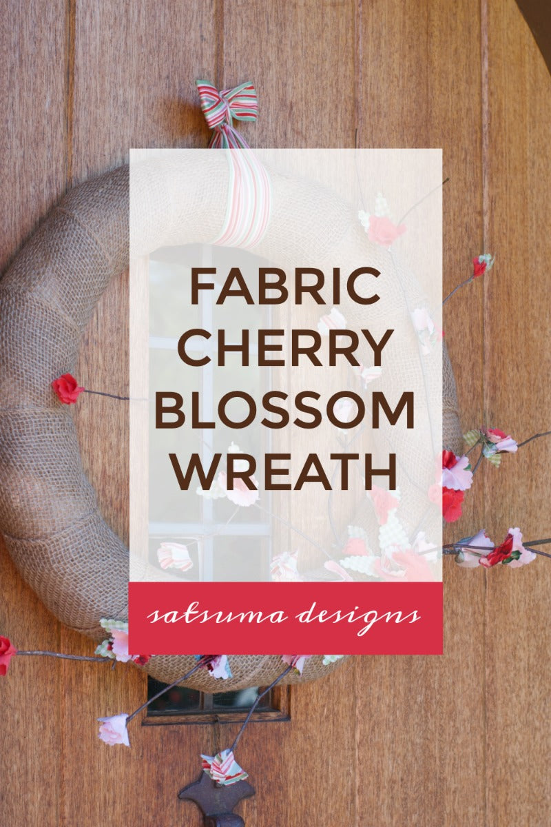 Fabric cherry blossom wreath project for springtime decorating. Try this easy DIY wreath project to celebrate springtime. #springtime #spring #cherryblossoms #fabriccrafts #nosew 