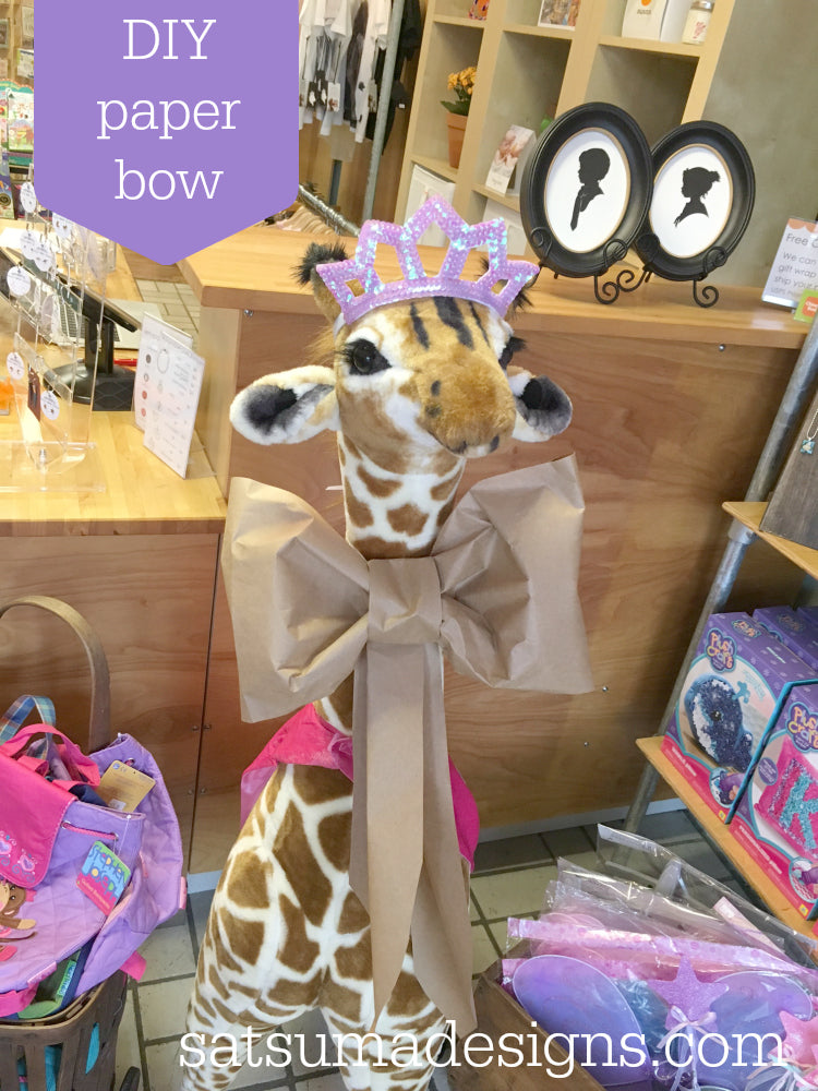 diy large paper bow on giraffe pin