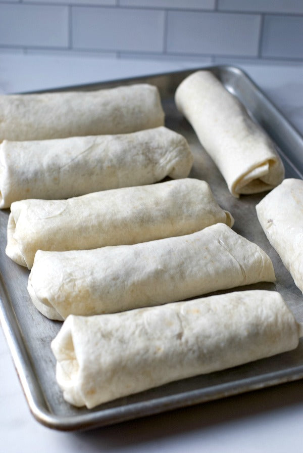 Philly cheesesteak burrito recipe for a quick and delicious weeknight meal. This easy recipe combines all the savory flavors of a philly cheesesteak with very affordable ingredients and the convenience of a burrito wrap! #philly #phillycheesesteak #dinner #whatsfordinner #burritorecipes #dinnerrecipes #savory #salty