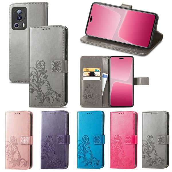 For Xiaomi 13 Lite Four-leaf Clasp Embossed Buckle Leather Phone Case(Purple)