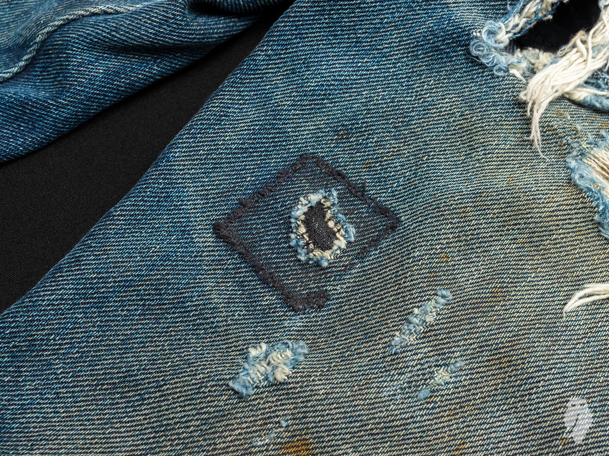 Naked Famous home repairs on sumi ink denim