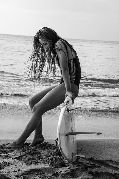 Photographer Olivia Doan captures a surfer girl on Hawaii