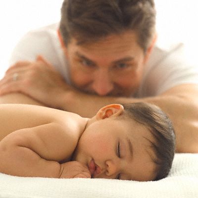 Parent watching baby sleep