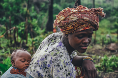 mother baby picking cotton