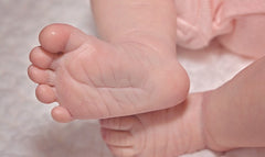 A baby's foot is the perfect example of the perfect foot with proper toe splay.