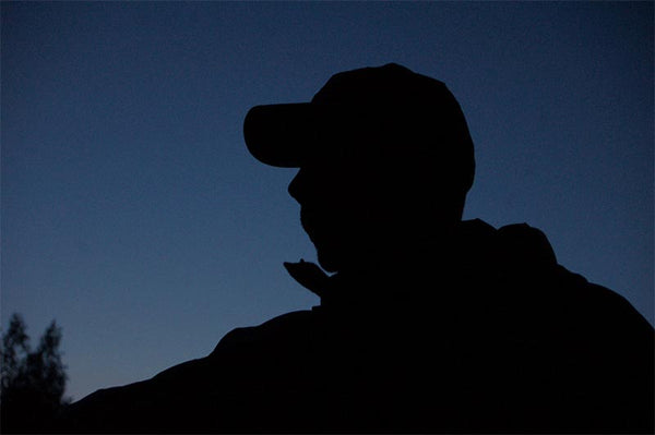 Night silhouette fly fishing