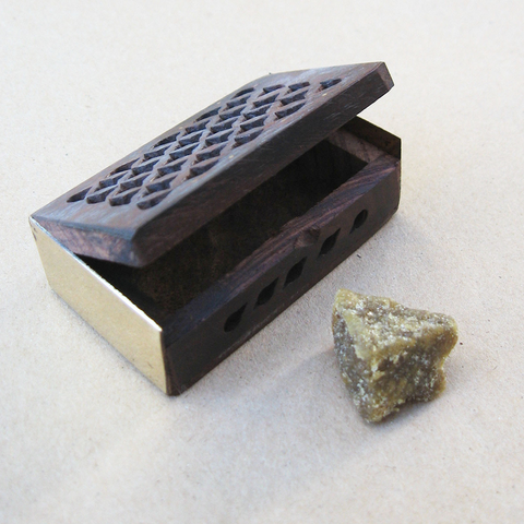 Amber resin with filigree box