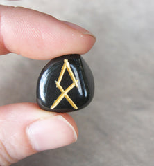 Holding a rune stone