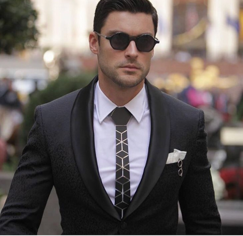 black suit with black hex tie