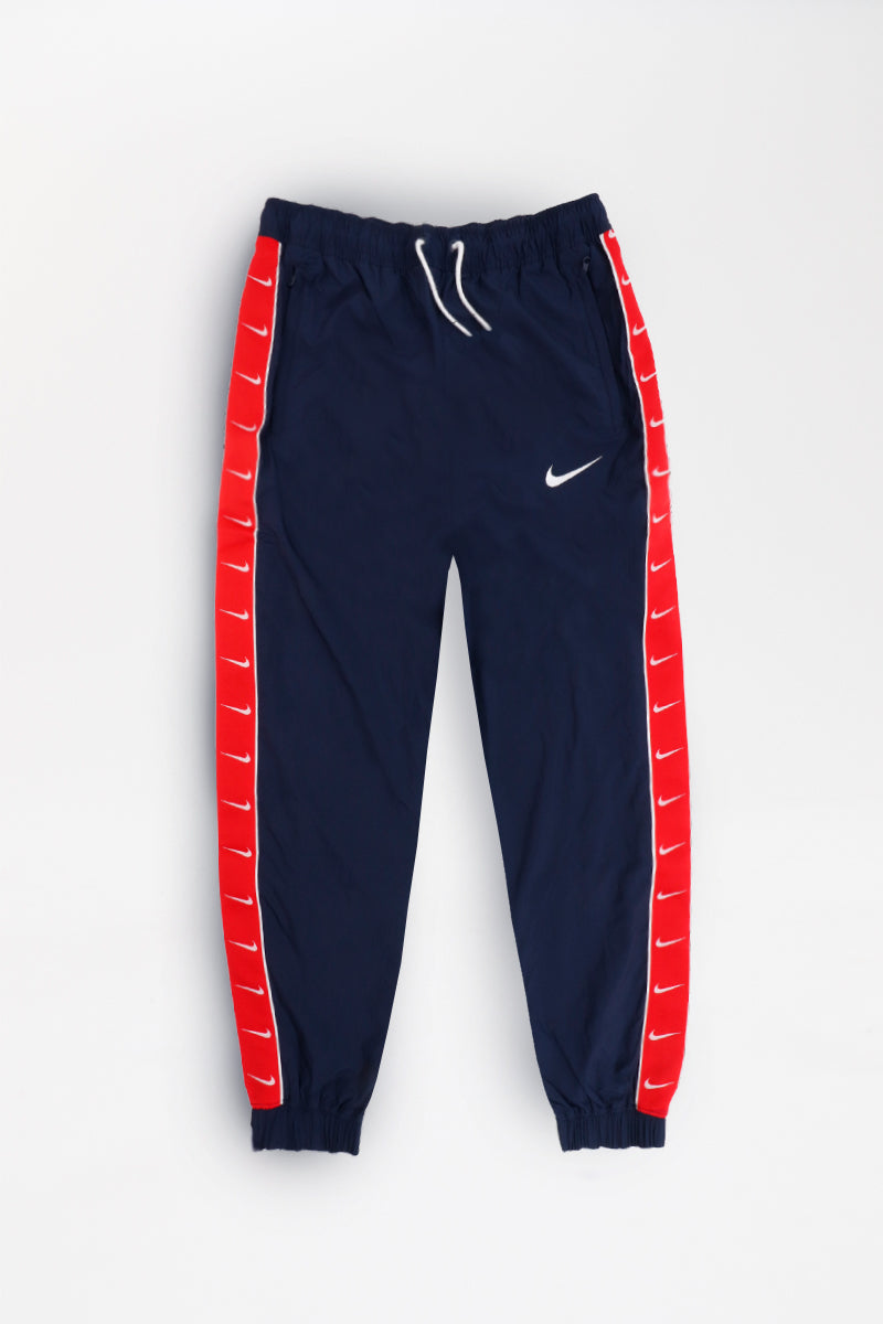 white and red nike pants