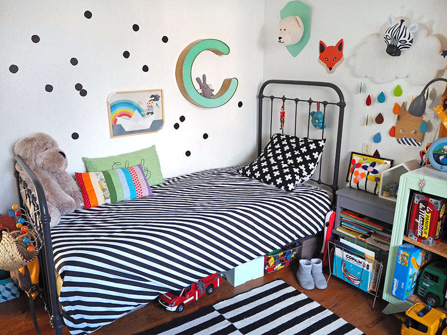 Felix and Charlie's multi-coloured shared bedroom, styled by Studio Des Jolis Momes