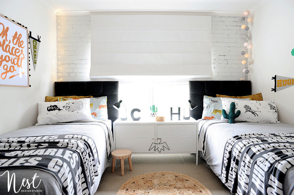 Boys' shared bedroom, created by Nest Design Studio and featured on Bobby Rabbit.