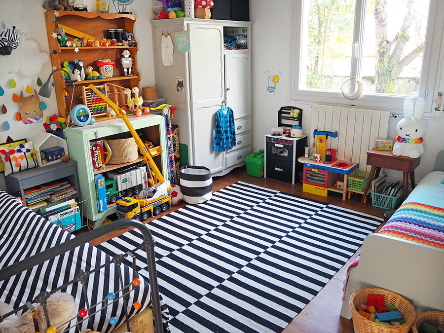 Felix and Charlie's multi-coloured shared bedroom, styled by Studio Des Jolis Momes