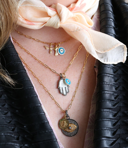 necklace layers with spiritual charms