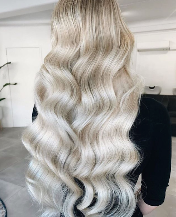 woman donning THICK Halo in Col. Platinum Blonde #60 halo hair extensions