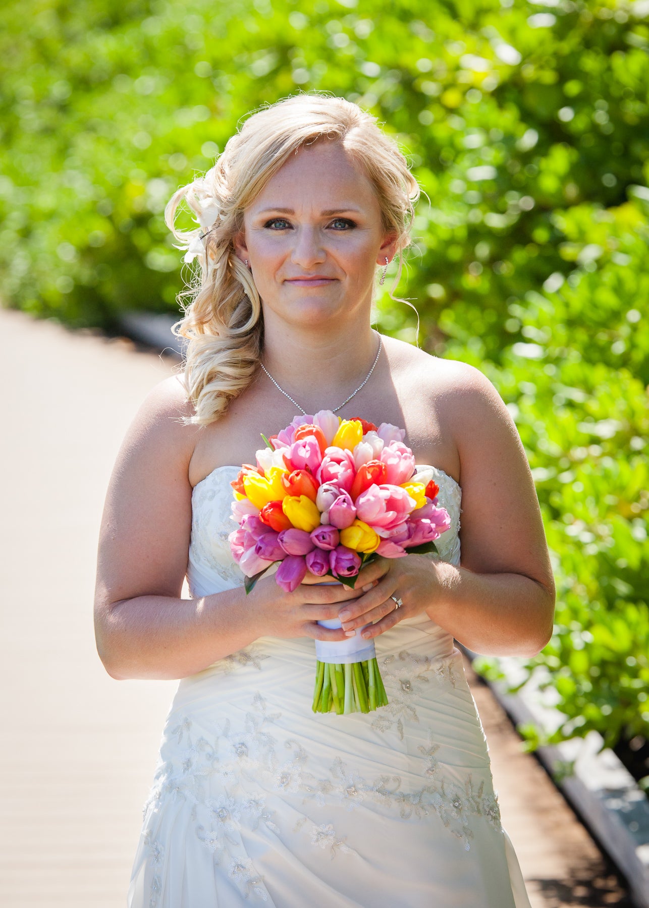 Bride poses with Bouquet in Maui, Hawaii