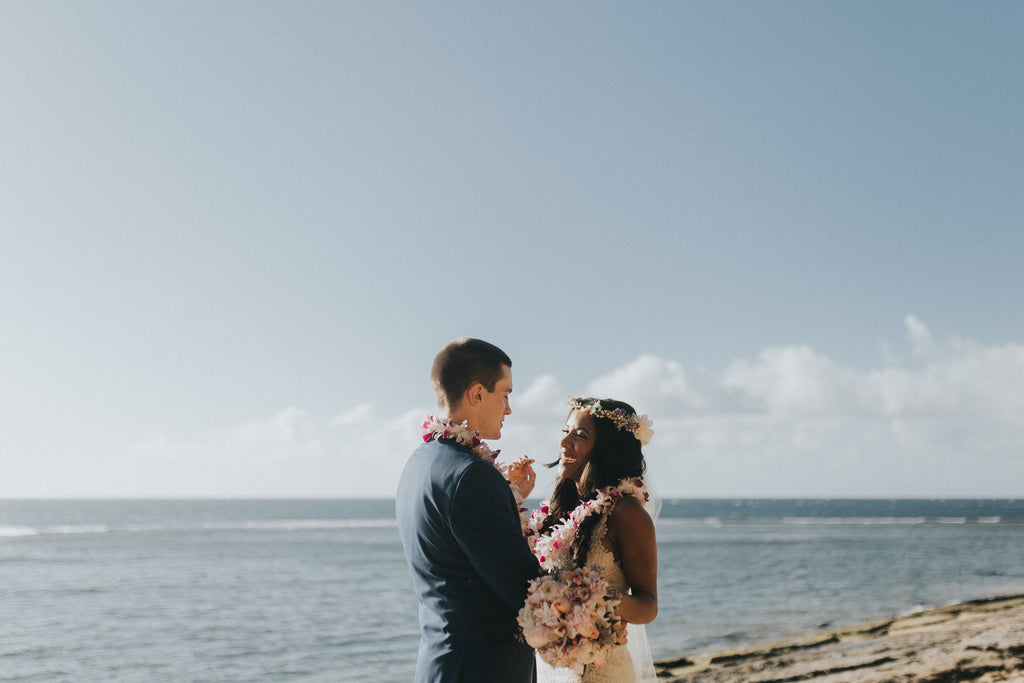 Just Married! A Bride and Groom laugh after getting married in Kauai