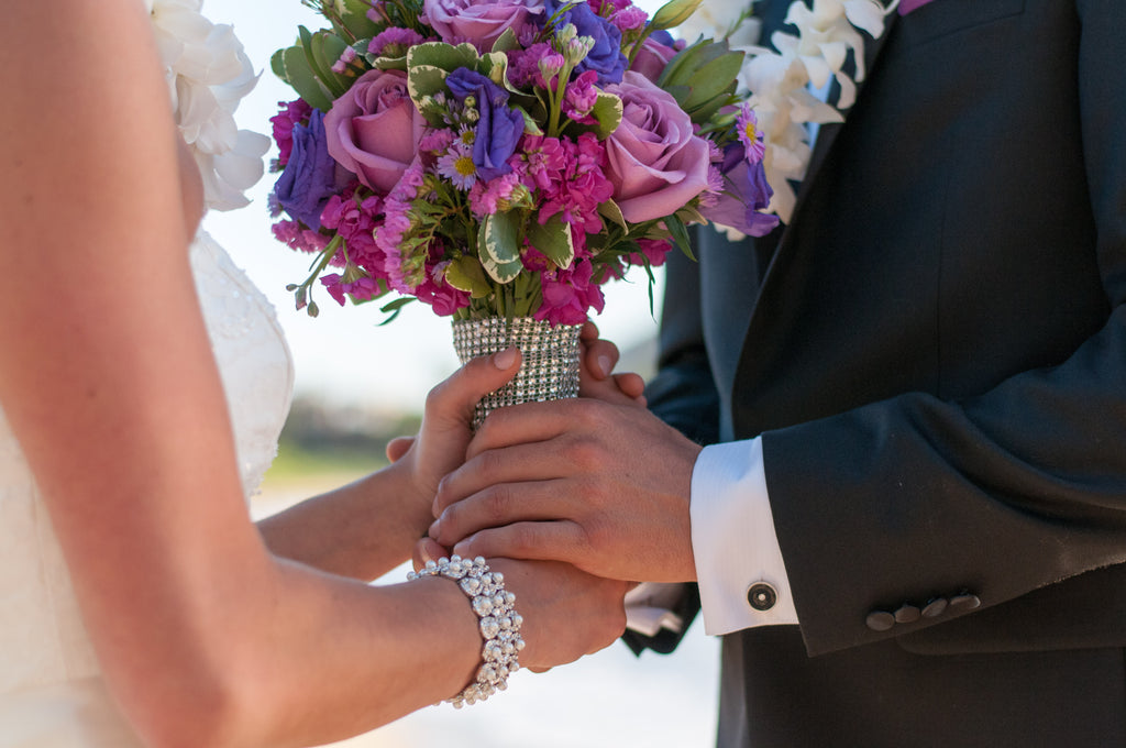 Bride and Groom hand in hand!