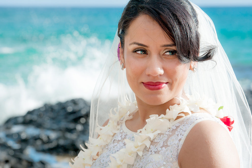 A Bride awaits her Groom on the beach in Makena, Maui