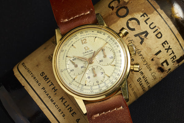 omega chronograph gold