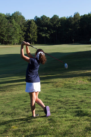 junior girls golf, practicing