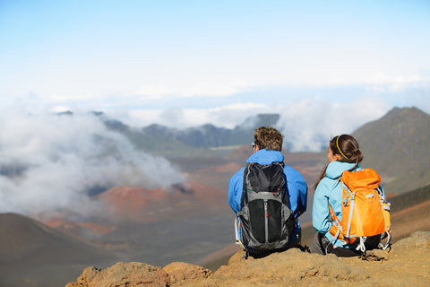 hikers overlooking volcano