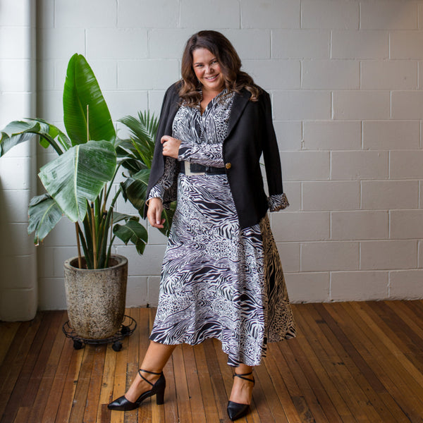 Stacey wearing our Sally shirt and Rylee skirt to create the look of a dress with a black belt and our black Kerryn blazer 