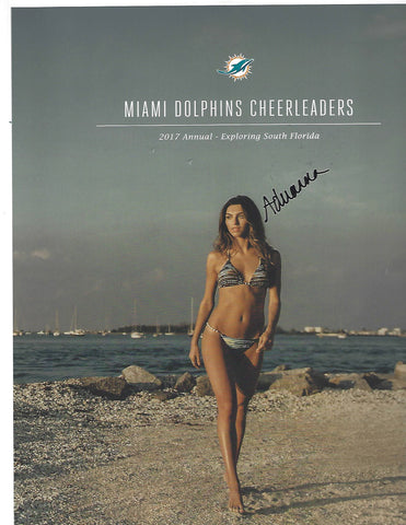 Miami Dolphins Cheerleaders 2017 Annual Cover Cheerleader Walking Beach inside featuring 7 Charming Sisters 