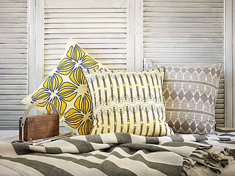 Nina and Ukelele Cushions in Straw Yellow with Palermo Stripe Cushion in Stone Grey