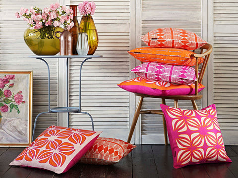 Huts and Nina Cushions in Pumpkin Orange and Fuchsia Pink