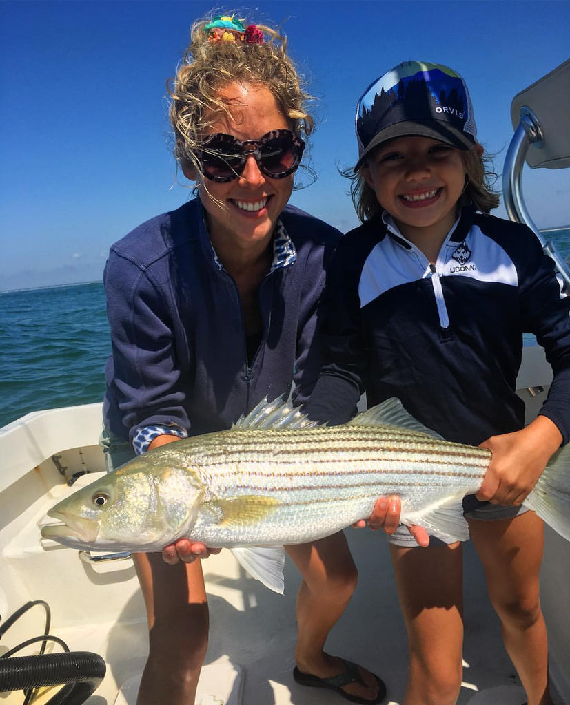 Abbie and her young client hooked into this Martha's Vineyard striper. 