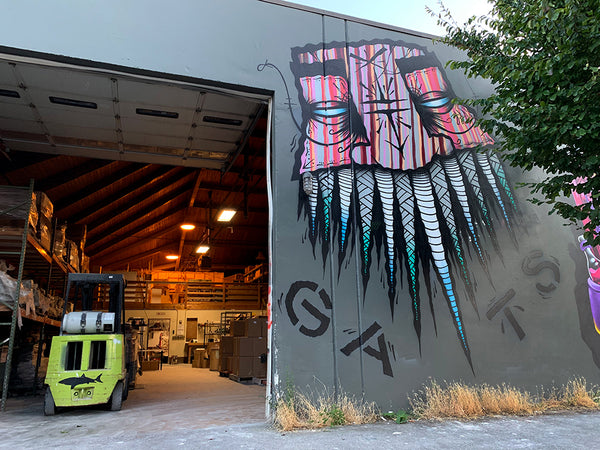 GATS Pink Spikey Totem Mask Graffiti piece  on wall 