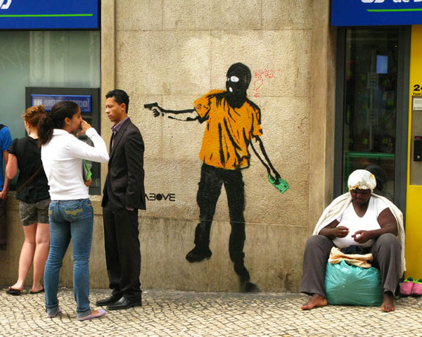 ABOVE street Art piece - Rich to poor in Lisbon