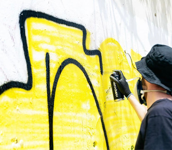 Graffiti artist using the all new MTN Pocket Fat Cap