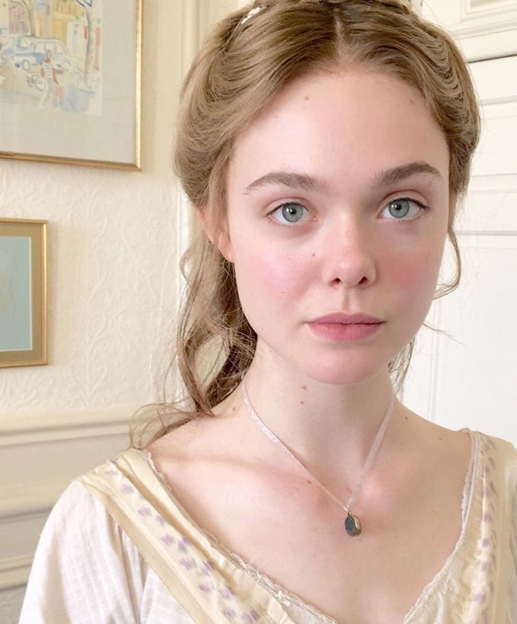 Elle Fanning is wearing Julie Hewett's Jami blush here