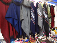 Traditional Alpaca Ponchos at the Otavalo Artisan Market in the Andes Mountains of Ecuador. Picture courtesy of David Adam Kess.